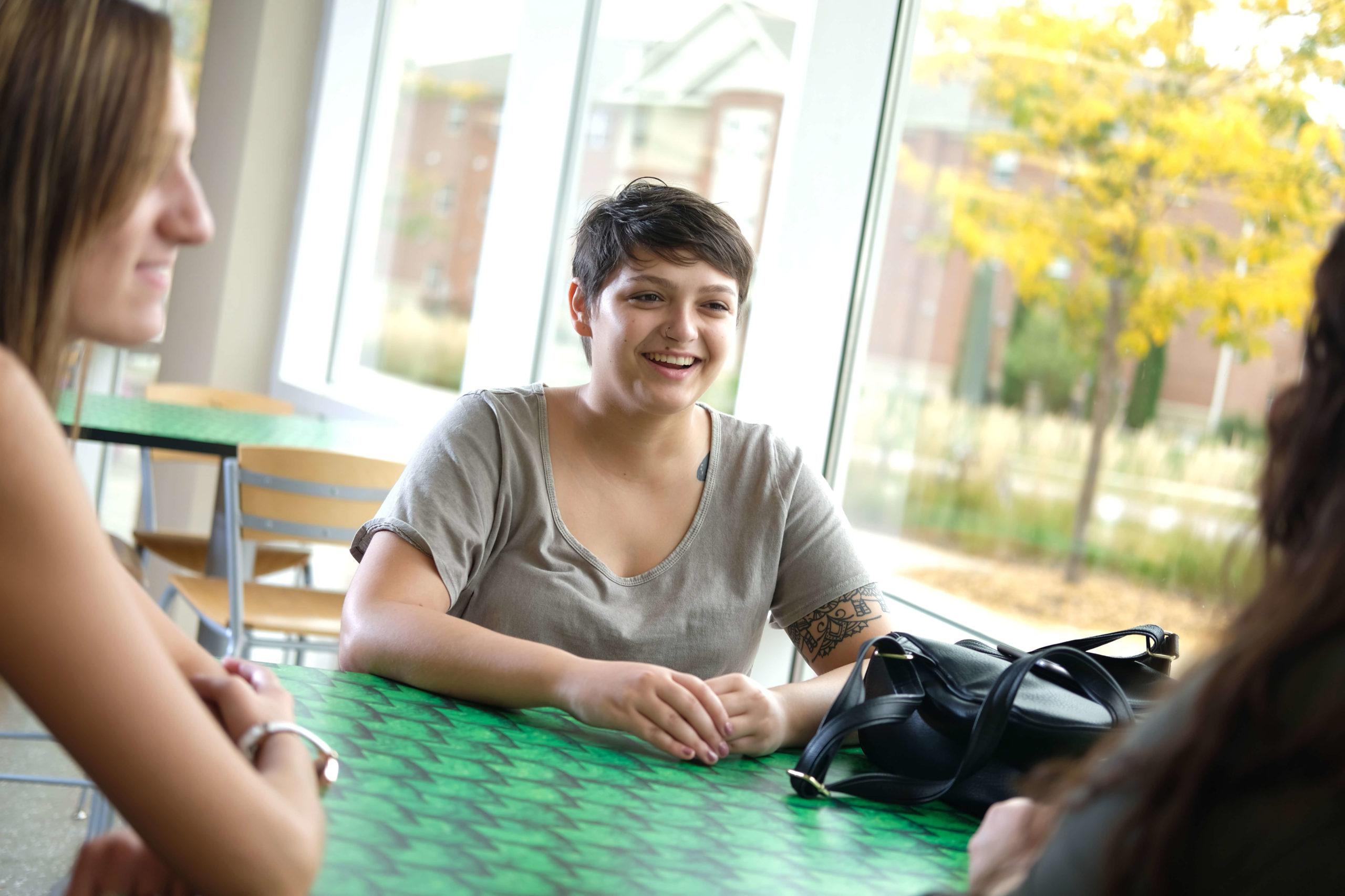 students at table in heminger